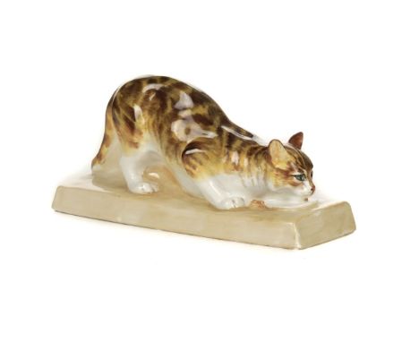 * Royal Worcester. "Cat Eating" modelled by Stella R. Crofts (2897), purple mark, 15cm longQty: (1)