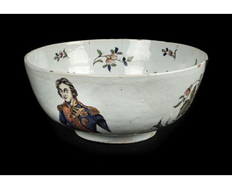 * Nelson (Horatio, 1758-1805). An early 19th century Delft bowl, polychrome painted with a portrait of Admiral Lord Nelson an