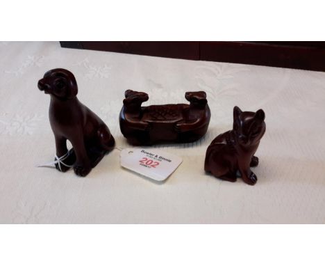 Three wooden netsuke animals, tallest is 8cm 