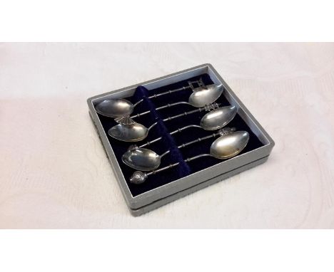 Six Sterling silver Japanese spoons in a a fitted box