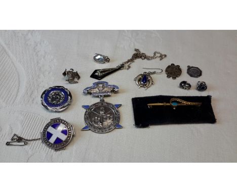 A collection of silver jewellery to include two silver nursing medals. One is made by Hamilton & Inches.