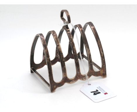 A Hallmarked Silver Five Bar Toast Rack, HCD, Birmingham 1931, of plain arch design with central loop handle (75grams). [6961