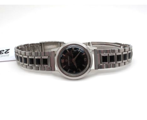 Eterna-Matic; A Vintage (Hidden Crown) Wristwatch, the signed black dial with Arabic numerals, dagger markers and centre seco