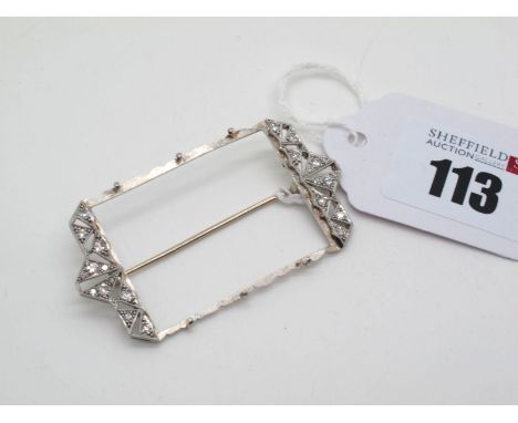 An Art Deco Style Diamond Set Brooch Mount, (lacking central rectangular panel) of geometric pierced design, inset with gradu