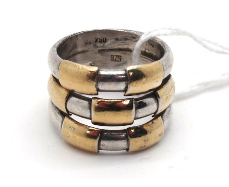 A Modern Wide Two Tone Dress Ring, of triple band geometric design, stamped "750" "975" (finger size M). 