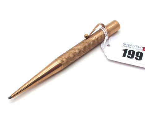 A 9ct Gold Baker's Pointer Pencil, with engine turned decoration and clip, 11.7cm long. 
