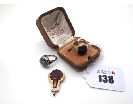 A Bloodstone Inset Signet Style Ring, stamped "375" (finger size M); A Hardstone Inset Swivel Fob / Pocketwatch Key; a novelt