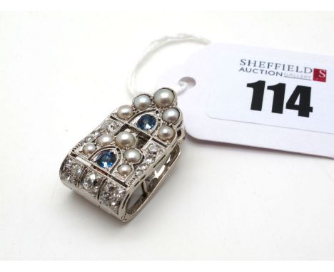 An Art Deco Diamond, Sapphire and Pearl Set Dress Clip, of shaped and pierced design, set with old cut stones, overall length