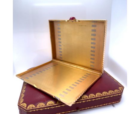 A Vintage Cartier Cigarette case, made in 1937. The rectangular fluted case is in yellow, rose and white 18ct gold Weighing 2