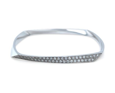 A Tiffany &amp; Co Frank Gehry Torque Bangle, made of 18ct White Gold. Bangle is set with 46 Round Brilliant Cut Diamonds, F-