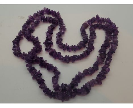 Amethyst necklace, gem weight 280cts, L: 90 cm, complete with case 