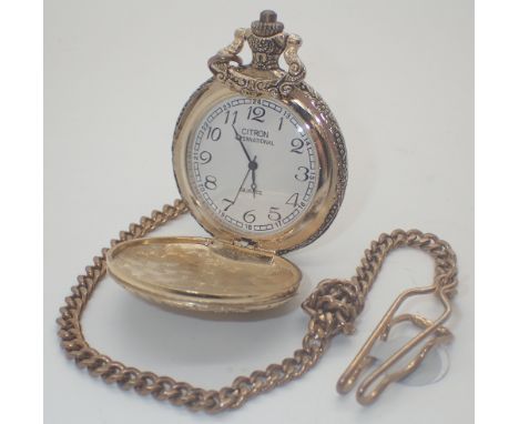 Quartz full hunter pocket watch with hunting scene on a watch chain