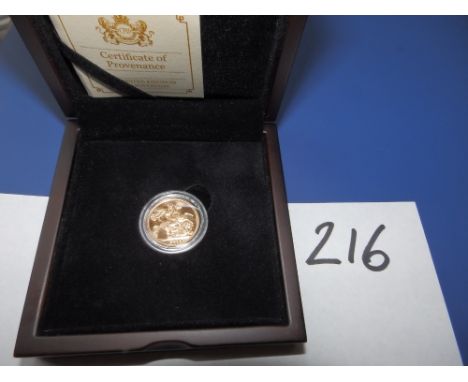 A 2013 cased gold sovereign with certificate.