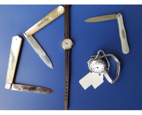 Three silver folding pen knives, a silver watch and bangle together with an Ingersoll watch. (6)