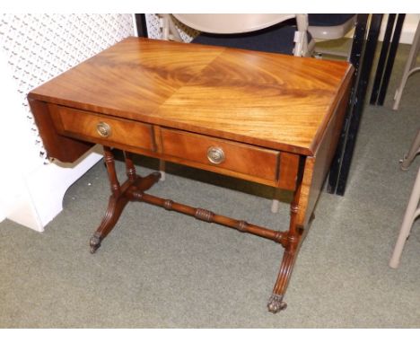 A small reproduction style occasional sofa table.