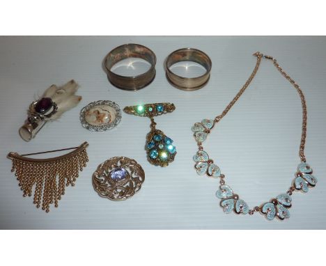 Selection of various costume jewellery and two silver hallmarked napkin rings 