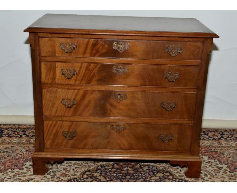 19th C style mahogany chest of four drawers on raised bracket feet of small proportions   