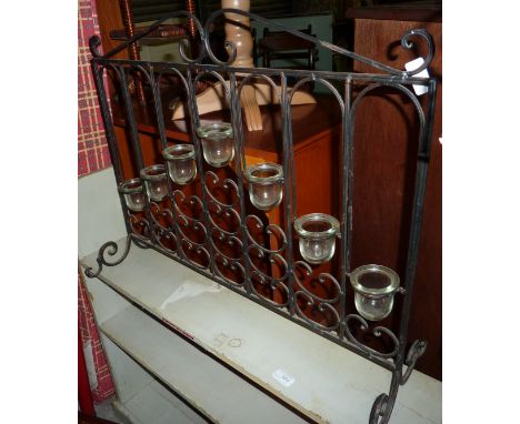 Wrought metal tea light holder 
