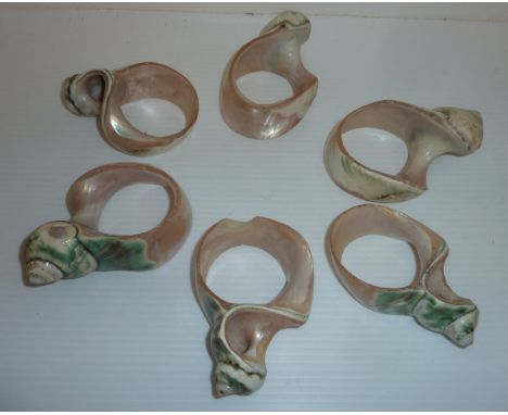 Six napkin rings made from conch shells 