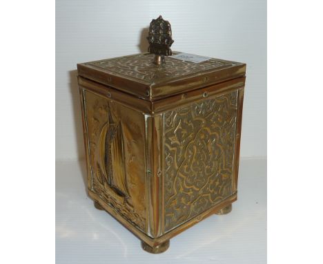 Brass tea caddy with embossed design and ship finial 