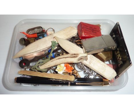 Selection of costume jewellery, spoons, tie clips, lighters, pens, a horn whistle etc