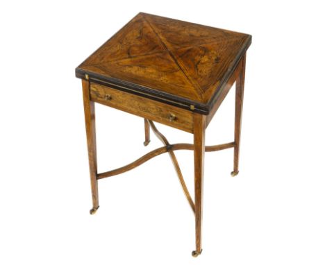 *Games Table. Edwardian inlaid rosewood games table,  the envelope top inlaid with classical vases and cornucopias, hinged to