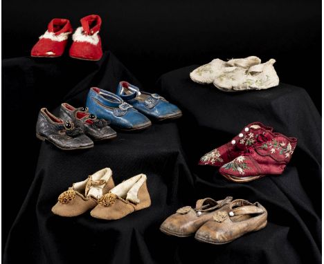 *Shoes. A collection of infants' shoes, late 19th/early 20th century,  seven pairs of shoes, including: a pair in gold ribbed
