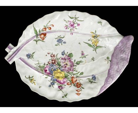*Leaf Dish. 18th century Worcester porcelain leaf dish,  decorated with flowers on a white ground, 35cm long, small hairline 