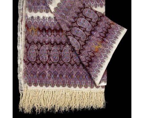 *Shawls. A very large shawl, possibly Norwich, circa 1860s,  printed shawl of fine wool and silk, with all-over pattern of bo