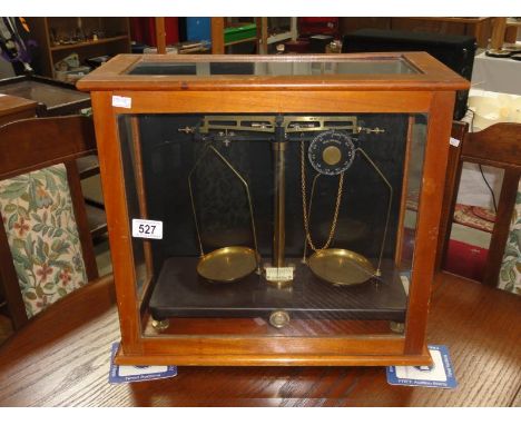 A cased set of apothecary scales by Griffin & Tatlock Ltd.,