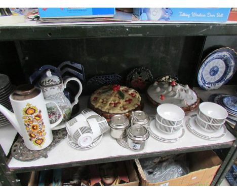 A shelf of miscellaneous including pie dishes, coffee pots etc.,