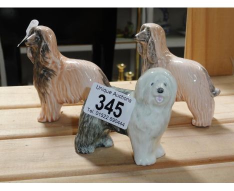 A Poole Pottery Old English Sheep dog and 2 Afghan hounds.