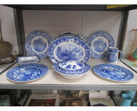 A shelf of blue and white table ware.