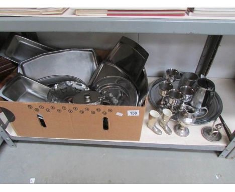 A shelf of assorted silver plate etc.,