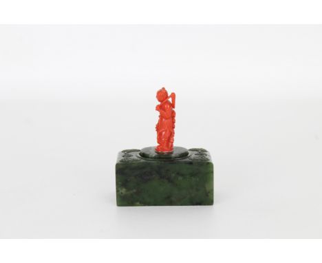 Unusual Carved Coral/Spinach Jade Snuff Box. With a carved coral figure on the lid of the box. Height: 3 in. Width: 2.25 in.