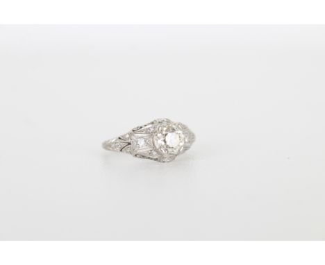 1.3CT Victorian Platinum Diamond Ring. Large  1.3CT center stone set in Victorian style  platinum ring accented with smaller 