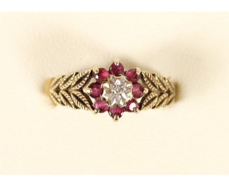 A 9ct gold ruby and diamond cluster ring, 2.6gm, N 