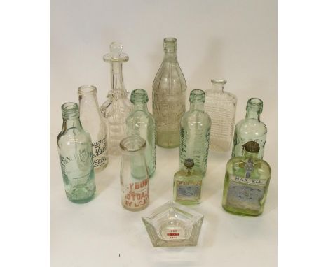 A collection of early 20th Century advertising pop bottles some of local interest, together with a box of ceramics, prints, t