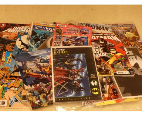 A collection of over thirty comics by IDW, DC, Image, covering Batman, Transformers, Green Arrow and others. 