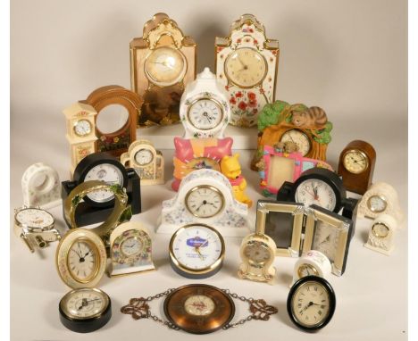 A collection of clocks to include, a Royal Albert 'Country Roses' clock, a Roger Lascelles alarm clock, a Winnie the Pooh ala