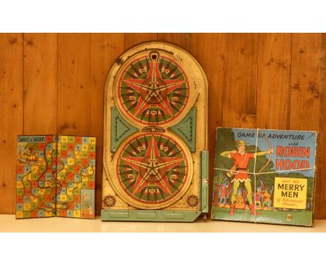 A 1930's tinplate bagatelle by Lindstrom's USA, together with a tinplate Snakes &amp; Ladders folding board and a Robin Hood 