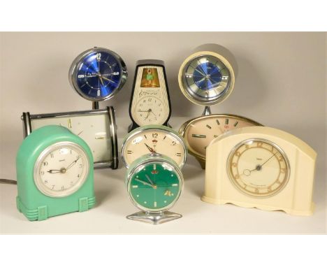 A collection of clocks to include, a Big Ben repeater Westclox manual wind, a Coral alarm clock, a Feranti Art Deco green Bak