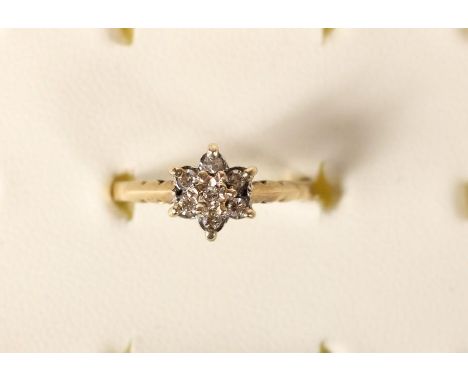 A 9ct gold and diamond cluster ring, 2gm, K 