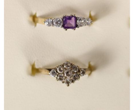 A 9ct gold amethyst and CZ five stone ring, M 1/2 and a CZ ring, K, 2.8gm 