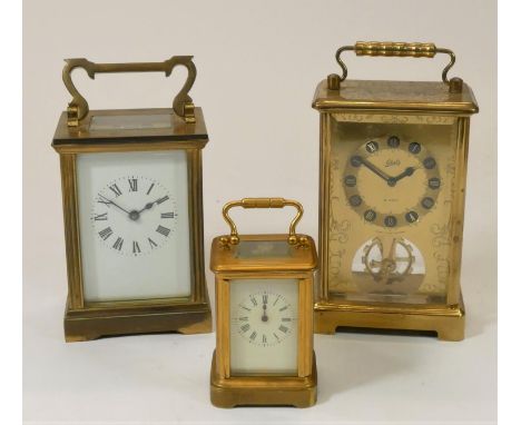 A Schatz 8 day, manual wind carriage clock, together with, an unmarked brass carriage clock and a miniature manual wind carri