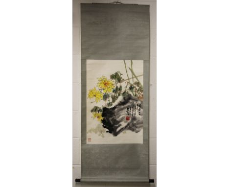 A 20TH CENTURY CHINESE HANGING SCROLL PAINTING ON PAPER, depicting yellow flowers, leafage and rockwork, the painting itself 