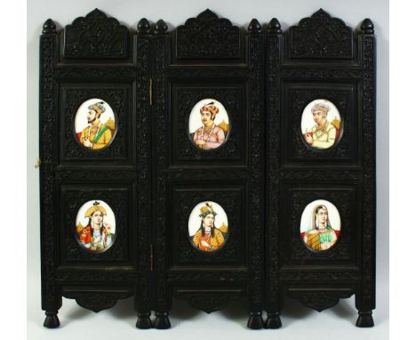 A SUPERB INDIAN SET OF SIX OVAL MINIATURE PAINTED PORTRAITS in a carved and ebonised wooden frame / three panel table screen,