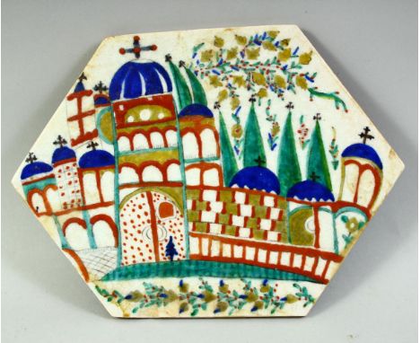 AN ARMENIAN KUTAHYA GLAZED POTTERY TILE, depicting an architectural scene, 25.5cm x 19cm.