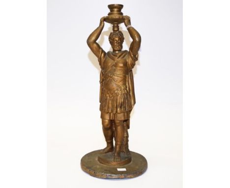 Antique cast metal Romanesque figural candlestick circa 1900, height 39cm approx
