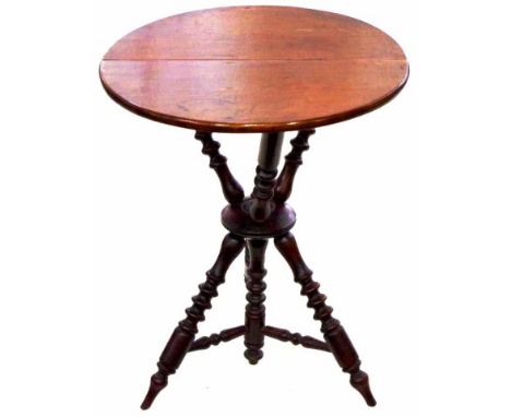 Victorina cedar topped occasional table with round top and tri footed turned legs. 55cm in diameter and 66cm tall. c1890.